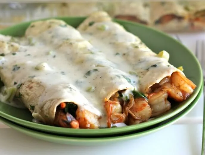 Enchiladas made of shrimp and creamy sauce